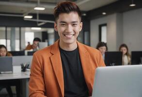 AI Generated Smiling young man using laptop at office desk. Fashionable attire suggesting creative industry employment. photo