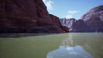 A serene mountain lake nestled among rocky cliffs video