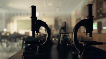 A pair of microscopes sitting on top of a table video