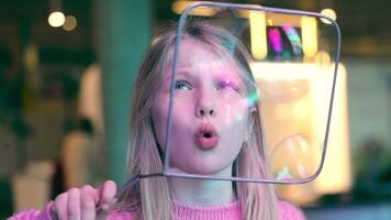 The Girl Blows Big Soap Bubbles. Happy Childhood. video