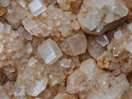 Close up view, stones, quartz and sand, white and beige stone texture for background photo