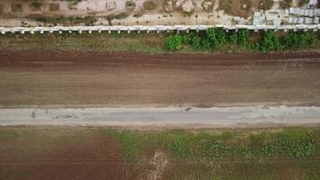 Grain elevator. Metal grain elevator in agricultural zone. Agriculture storage for harvest. Grain elevators on green nature background. Exterior of agricultural factory. Nobody. video