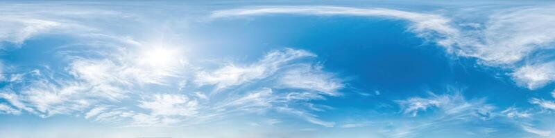 Blue sky with light clouds Seamless panorama in spherical equirectangular format with complete zenith for use in 3D graphics, game and for composites in aerial drone 360 degree panoramas as a sky dome photo