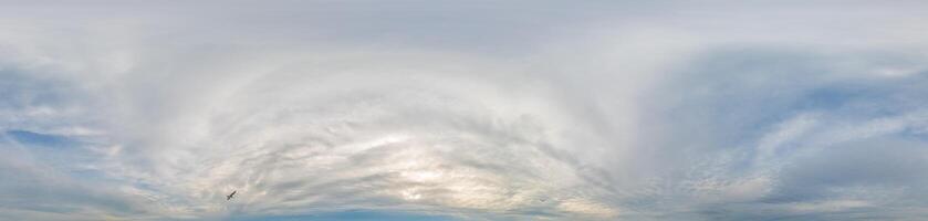 Sky panorama on overcast rainy day with low clouds in seamless spherical equirectangular format. Complete zenith for use in 3D graphics, game and for aerial drone 360 degree panorama as a sky dome photo