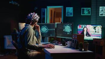 IT expert using EEG headset and machine learning to upload brain into computer, gaining immortality. Computer scientist develops AI experiment, inserting his persona into cyberspace, camera B video