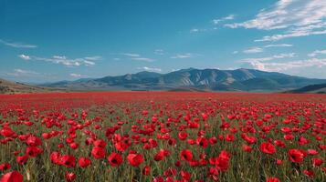 ai generado campo de rojo flores con montañas en antecedentes foto