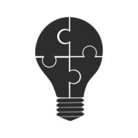 Light bulb icon from a puzzle piece vector