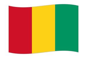 Waving flag of the country Guinea. Vector illustration.