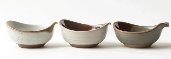 AI generated A set of three white and brown glaze handmade ceramic bowls photo