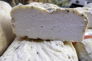 Pieces of cheese in a market photo