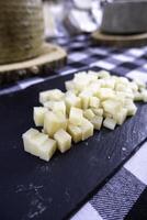 Pieces of cheese in a market photo