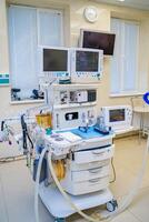 Medical devices, Interior hospital design concept. Interior of operating room in modern clinic, screen with tests closeup photo