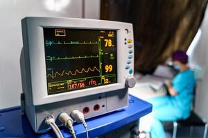 Mechanical ventilation equipment. Pneumonia diagnosting. Ventilation of the lungs with oxygen. Monitor with results. photo