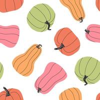 Hand drawn cute autumn seamless pattern with colorful pumpkins. Flat vector Halloween and Thanksgiving print design in doodle style. Repeated background fall harvest wrapping or wallpaper.