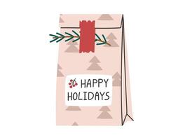 Hand drawn cute illustration of paper gift bag with pine branch. Christmas holiday craft present packing. Flat vector Xmas, New Year sticker in colored doodle style. Isolated on white background.