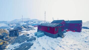 antarctic base set in a natural harbor in front of the Antarctic Peninsula video