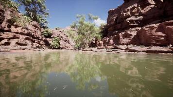 landscape with red sandstone rock and river video