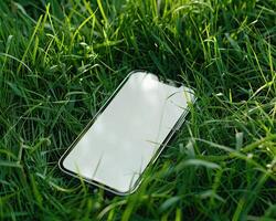 AI generated Modern smartphone mockup scene. Smartphone mockup template with blank white screen on green grass. photo