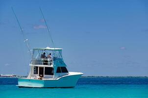 Hatteras yacht in mexican caribbean photo