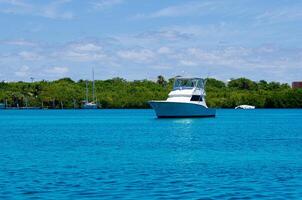 Hatteras yacht in mexican caribbean photo