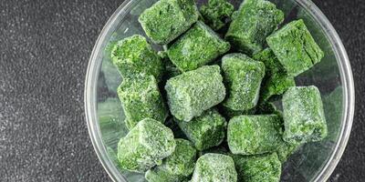 spinach frozen cube semifinished fresh food tasty healthy eating cooking meal on the table photo