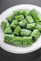 spinach frozen cube semifinished fresh food tasty healthy eating cooking meal on the table photo