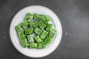 frozen spinach portion cube semifinished fresh food tasty healthy eating cooking meal snack photo