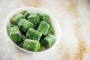 frozen spinach portion cube semifinished fresh food tasty healthy eating cooking meal snack photo