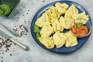 Tortelloni with spinach filling photo