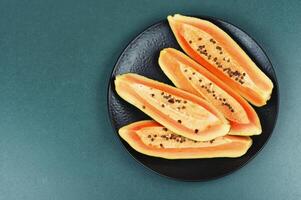 Fresh papaya, tropical fruits. photo