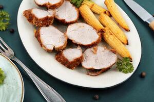 Baked pork slices. photo