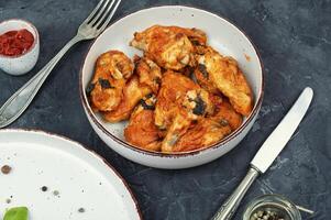 Baked barbecue chicken wings photo