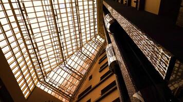 Futuristic Elevator in beautiful building. Stock footage. Modern Elevator design in beautiful light building with high Windows and warm lighting video