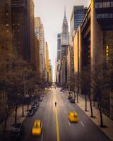 a city street with a yellow taxi cab driving down it photo