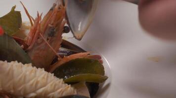 Putting lime on sushi with daikon, lemon slices video