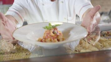 Presentation of a ready-to-eat pasta dish on camera video
