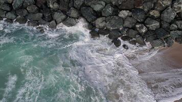 Drone flight over the waves of the surf with foam video
