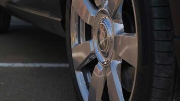 Close-up of the wheel of an expensive premium limousine video