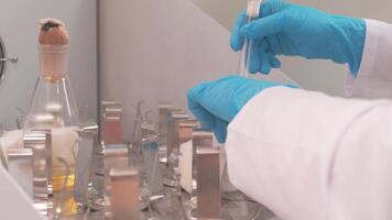 Work on samples of substances is carried out in the laboratory video