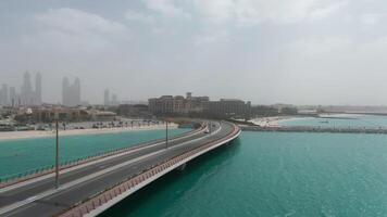 Bay bridge towards Bulgari hotel in Dubai in cloudy afternoon video