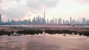 Drone shoots a panorama of Dubai during sunset video