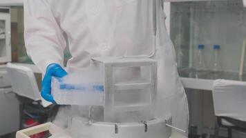 Laboratory samples are taken from a liquid nitrogen fridge video