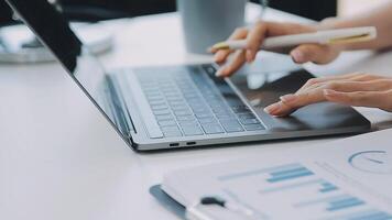 Business woman using calculator for do math finance on wooden desk in office and business working background, tax, accounting, statistics and analytic research concept video