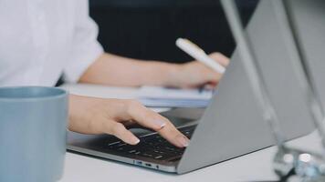 Business woman using calculator for do math finance on wooden desk in office and business working background, tax, accounting, statistics and analytic research concept video