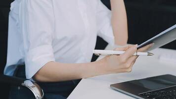 Business woman using calculator for do math finance on wooden desk in office and business working background, tax, accounting, statistics and analytic research concept video