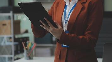 Business woman using calculator for do math finance on wooden desk in office and business working background, tax, accounting, statistics and analytic research concept video