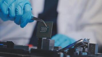 Close up portrait of computer engineer's hand is holding CPU's computer. video