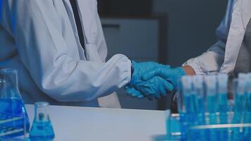 Female Research Scientist Uses Micropipette Filling Test Tubes. Scientist Works in a Team of Scientists Trying to Cure Deadly Disease, They Work in a Big Laboratory Research Center. video