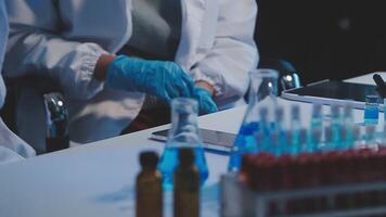 Female Research Scientist Uses Micropipette Filling Test Tubes. Scientist Works in a Team of Scientists Trying to Cure Deadly Disease, They Work in a Big Laboratory Research Center. video