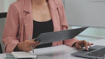 Audit concept,Administrator business man financial inspector and secretary making report calculating balance. Internal Revenue Service checking document. video